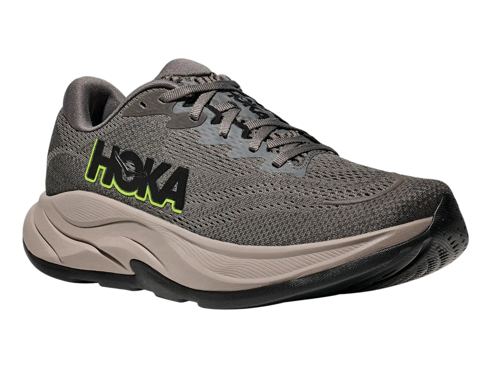Tenis deportivos HOKA Rincon 4 color gris asfalto con suela gruesa color gris claro.