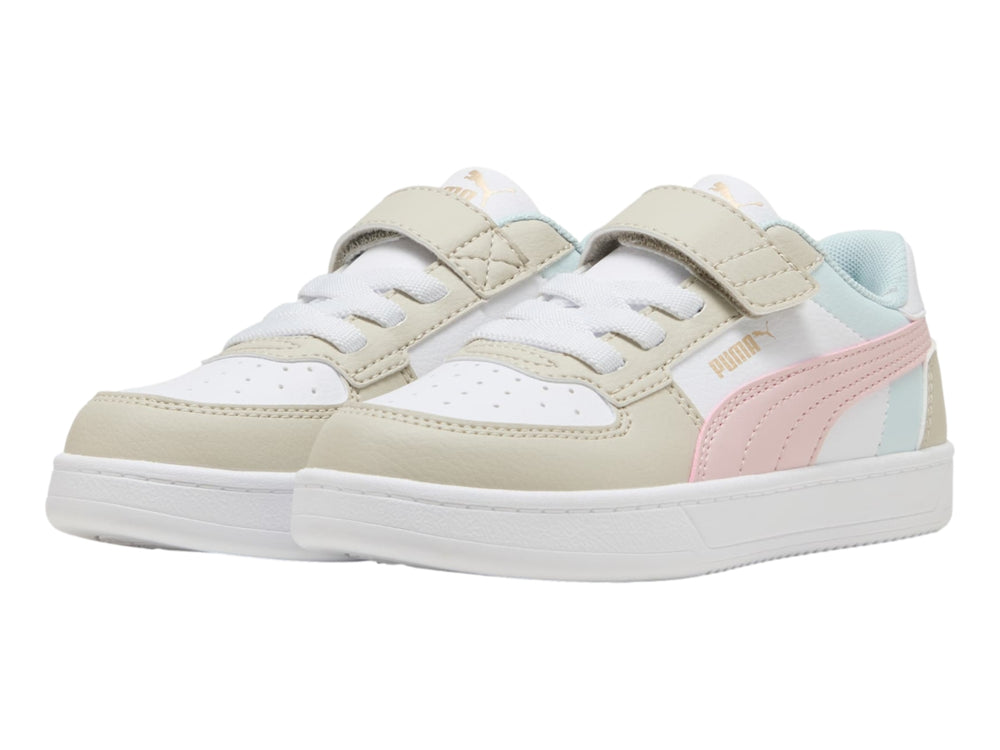 Tenis PUMA infantiles en colores blanco, beige, rosa y azul claro con cierre de velcro y agujetas.