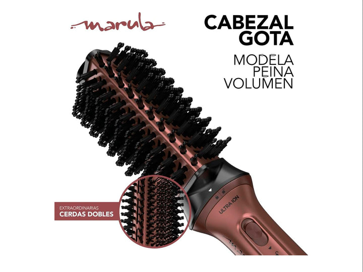 Cepillo moldeador de cabello GAMA ITALY en color rosa con accesorios y cabezal intercambiable sobre fondo blanco.