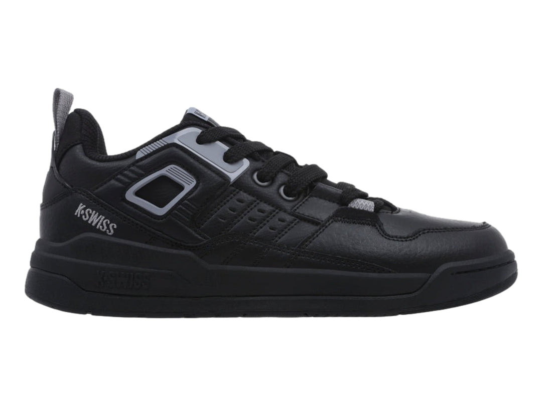 Tenis deportivos K-Swiss color negro con detalles en gris, diseño de corte bajo y suela plana.