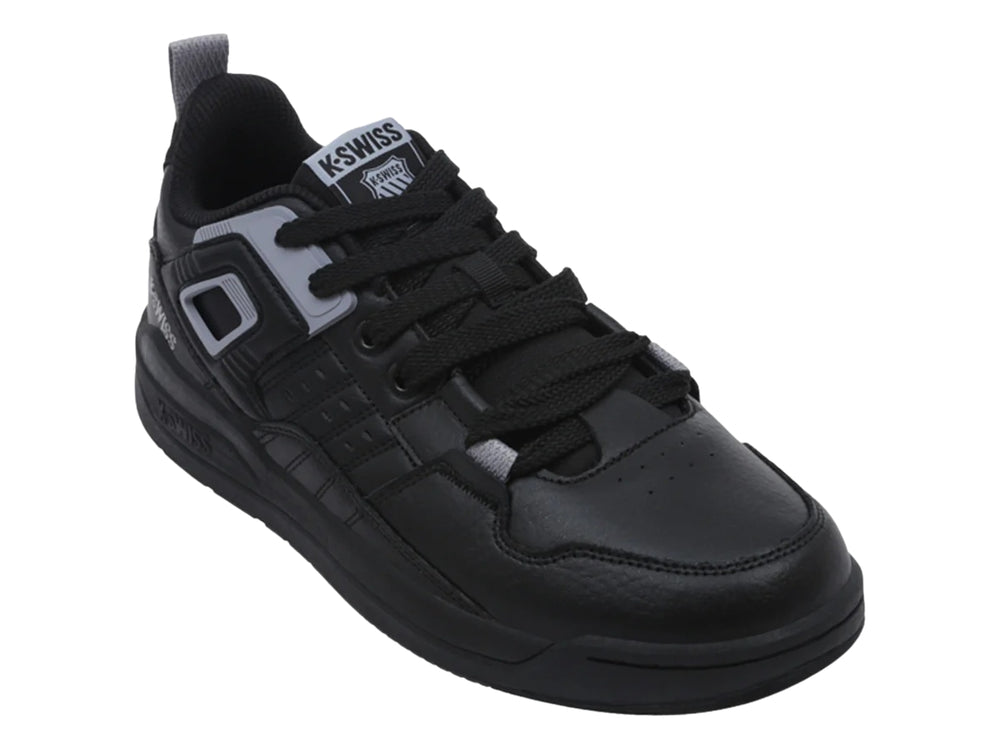 Tenis deportivos K-Swiss color negro con detalles en gris, diseño de corte bajo y suela plana.