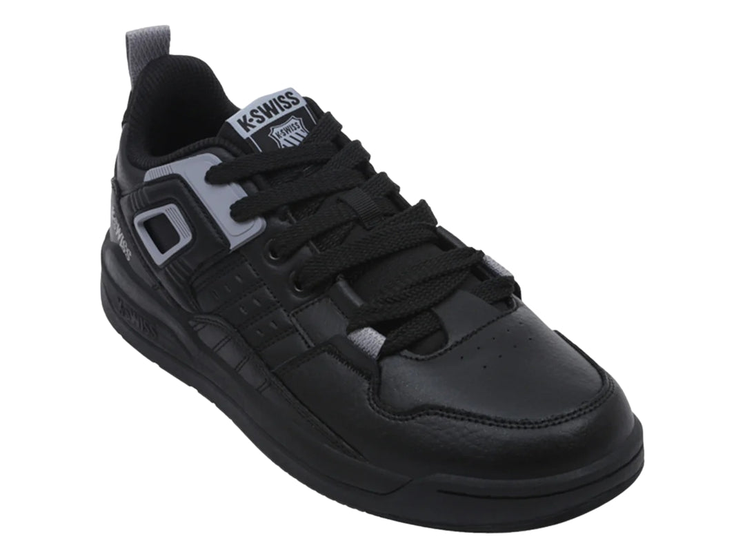 Tenis deportivos K-Swiss color negro con detalles en gris, diseño de corte bajo y suela plana.