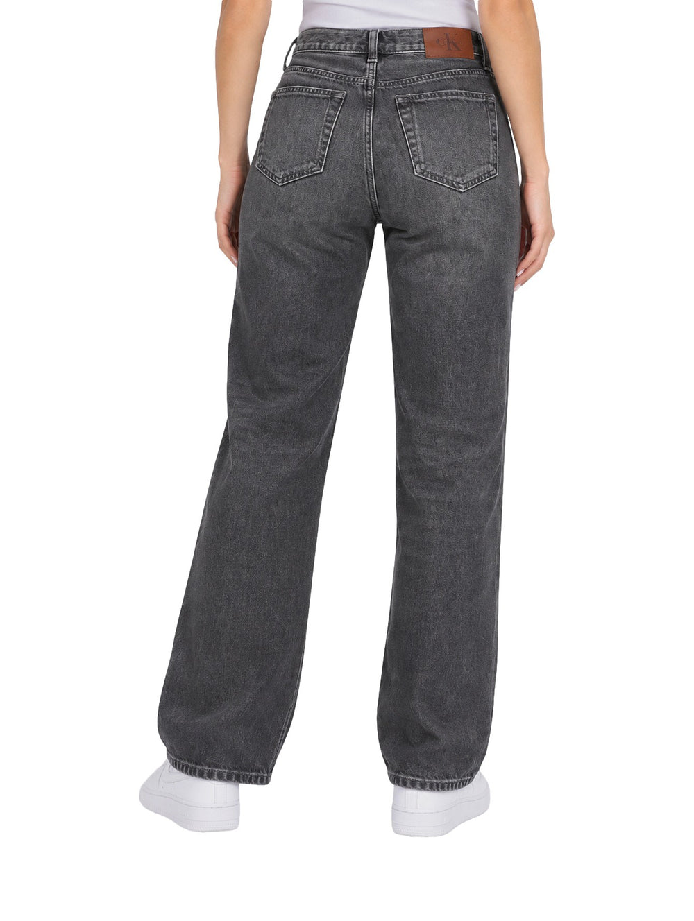 Jeans Calvin Klein negros suavizados de corte recto con roturas en las rodillas