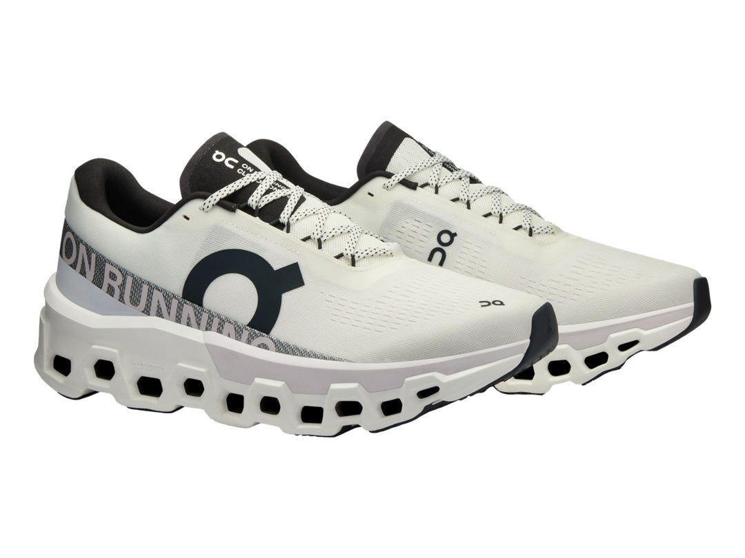 Tenis deportivos On CloudMonster 2 en color blanco y frost con suela gruesa y diseño moderno.