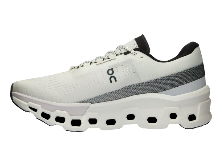 Tenis deportivos On CloudMonster 2 en color blanco y frost con suela gruesa y diseño moderno.