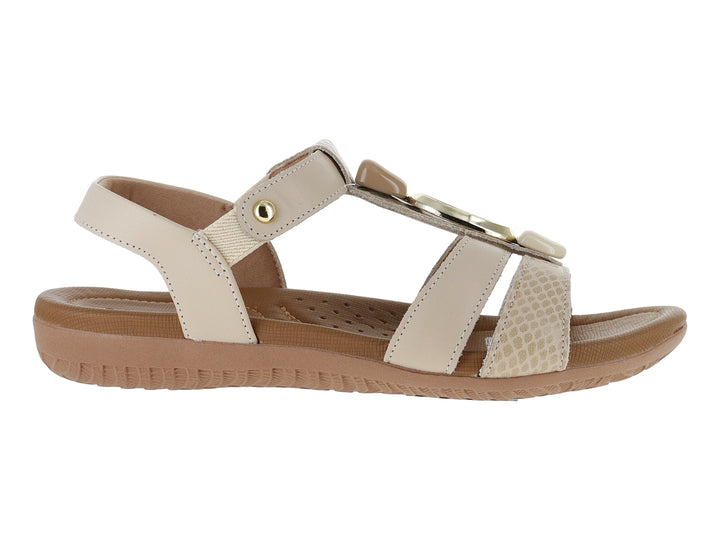 Sandalias de confort Usaflex color vainilla con suela café y tiras ajustables para mujer.
