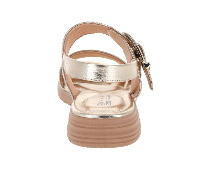 Sandalias color oro con hebilla y suela beige para Mujer.