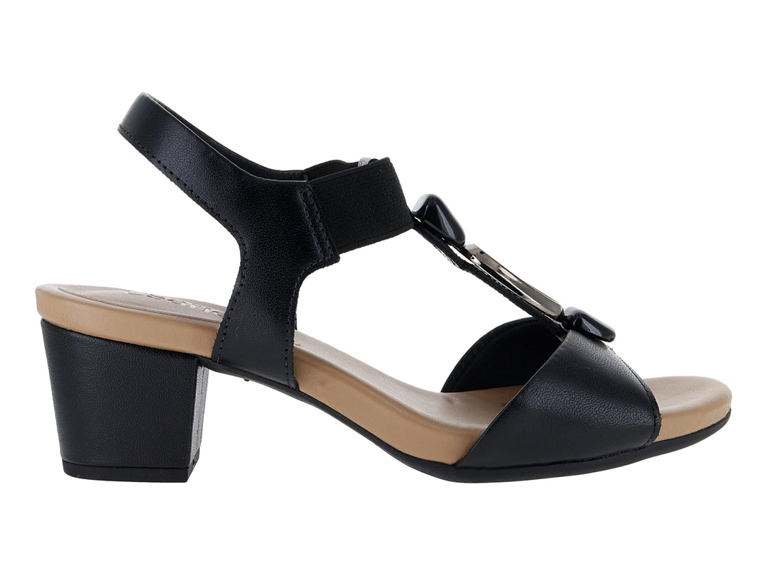 Sandalia negra de tacón bajo con correa y plantilla beige para mujer.