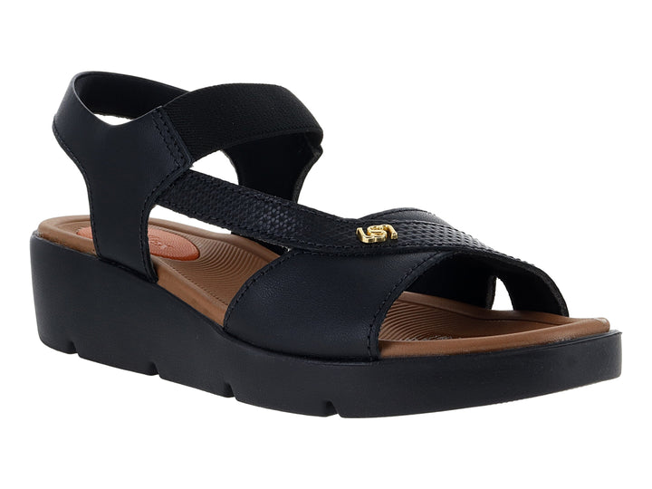 Sandalia de plataforma color negro para mujer con plantilla marrón y correa.