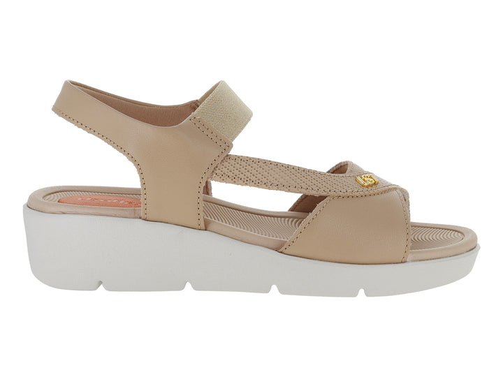 Sandalias de plataforma color blush con suela blanca y correas elásticas para mujer.