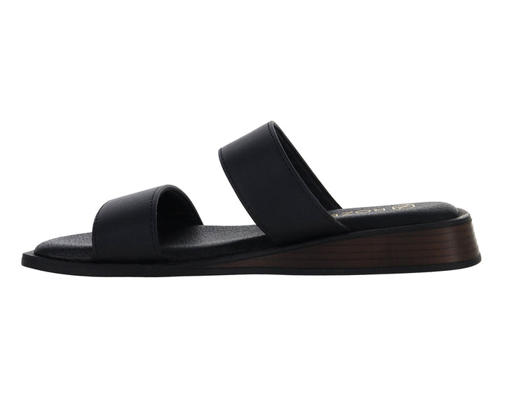 Sandalias negras de plataforma para mujer con dos tiras anchas y un pequeño detalle dorado.