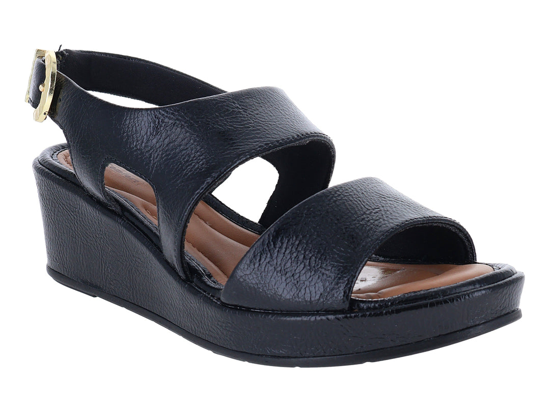 Sandalia negra de plataforma con hebilla dorada y suela cuña para Mujer.