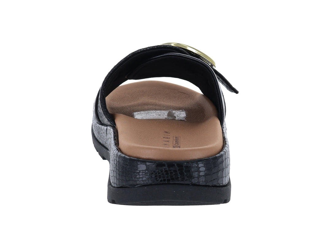 Sandalias negras de confort Ramarim con hebilla dorada y suela texturizada para mujer.