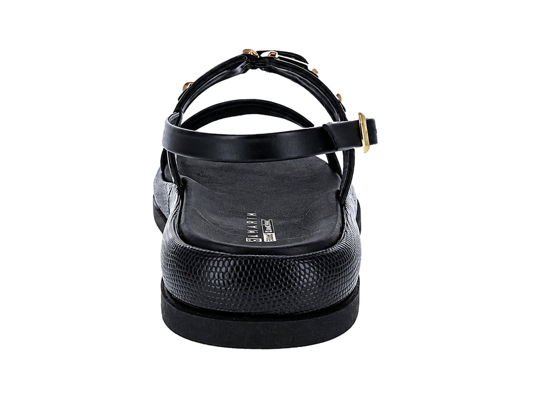 Sandalias negras Ramarim para mujer con hebillas doradas y suela gruesa texturizada.