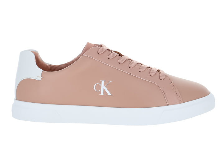 Tenis Calvin Klein de cuero color rosa con suela blanca y corte bajo.