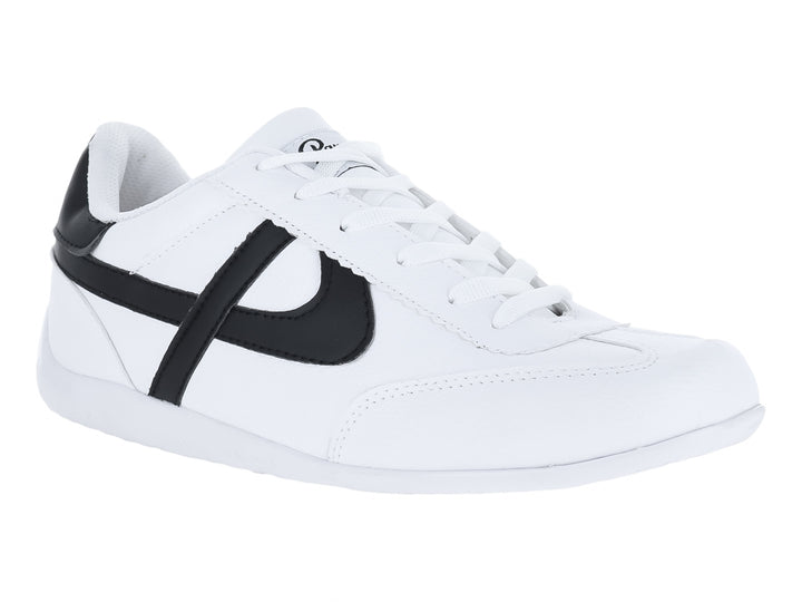 Tenis Panam blancos con franjas negras laterales y suela blanca.