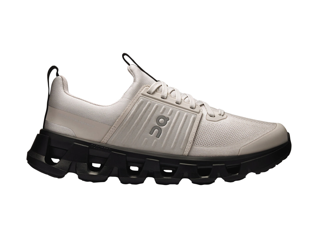 Tenis deportivos On Cloud para niños en color gris wolf con suela negra robusta.