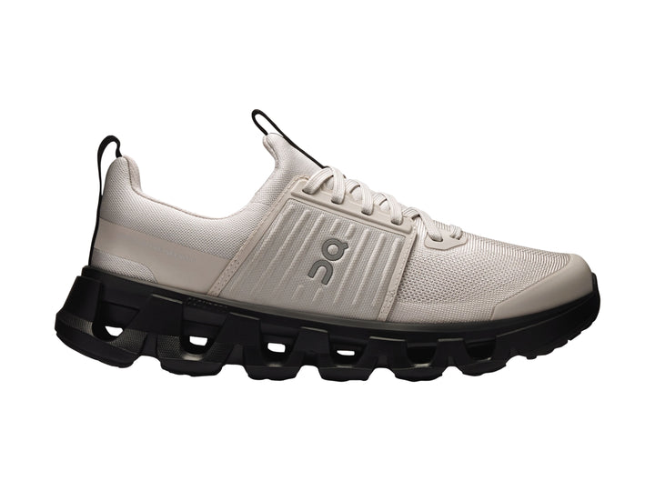 Tenis deportivos On Cloud para niños en color gris wolf con suela negra robusta.