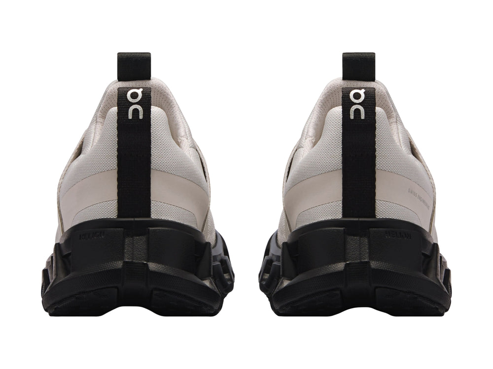 Tenis deportivos On Cloud para niños en color gris wolf con suela negra robusta.
