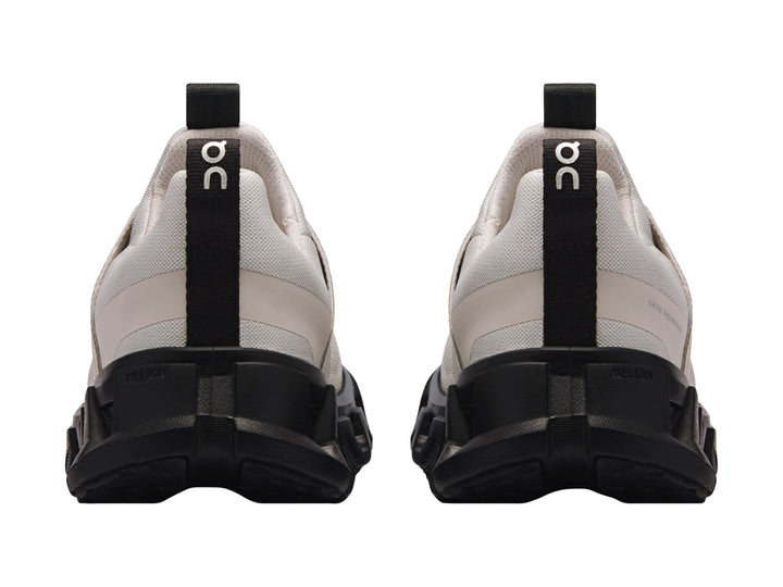 Tenis deportivos On Cloud para niños en color gris wolf con suela negra robusta.