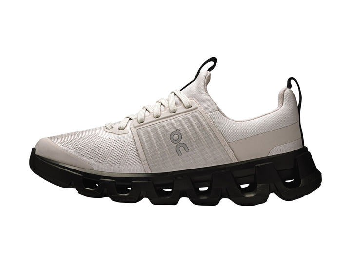 Tenis deportivos On Cloud para niños en color gris wolf con suela negra robusta.