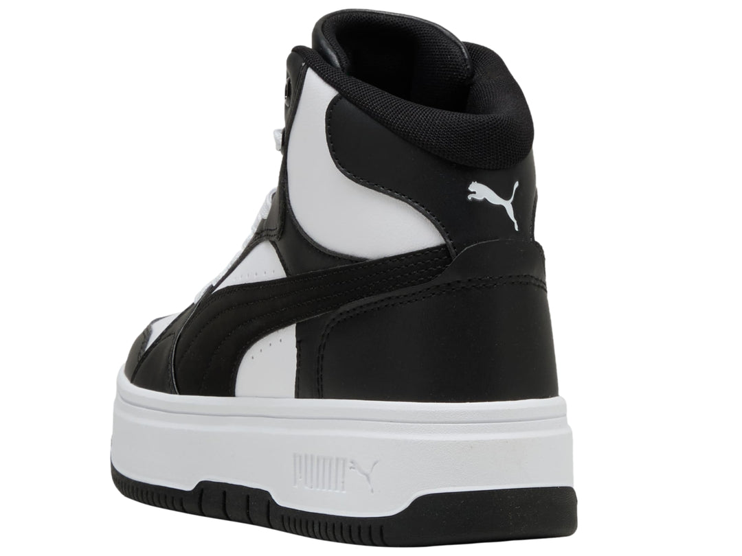 Tenis PUMA Rebound Femme Mid en colores blanco y negro con suela de plataforma blanca.
