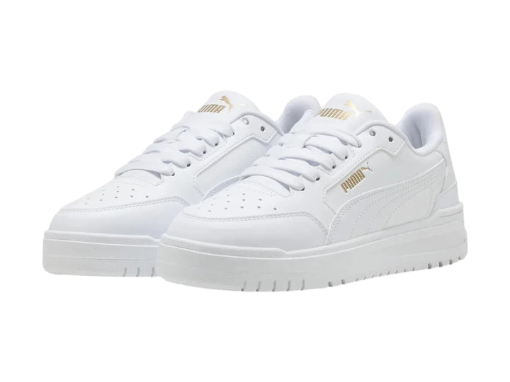 Tenis PUMA Shuffle Downtown Lo JR en color blanco total con suela ancha para niños.