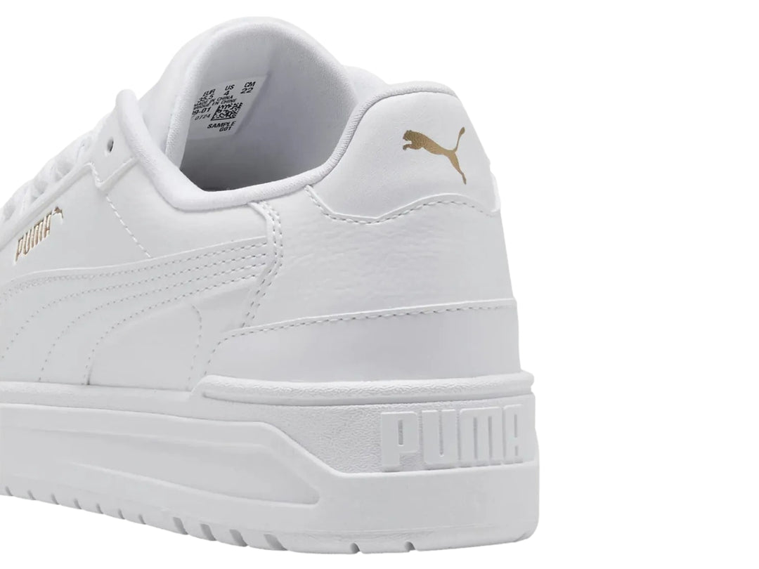 Tenis PUMA Shuffle Downtown Lo JR en color blanco total con suela ancha para niños.