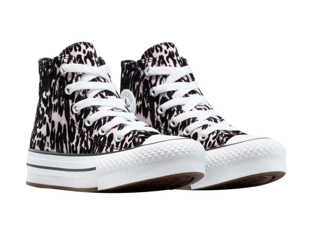 Tenis Converse Chuck Taylor All Star de bota con estampado animal print en rosa y negro y suela de plataforma blanca.
