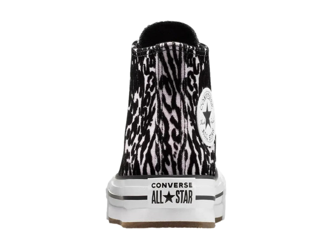 Tenis Converse Chuck Taylor All Star de bota con estampado animal print en rosa y negro y suela de plataforma blanca.
