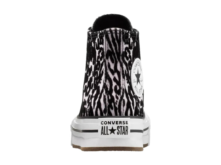Tenis Converse Chuck Taylor All Star de bota con estampado animal print en rosa y negro y suela de plataforma blanca.