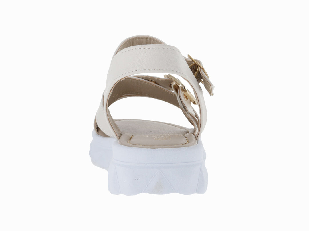 Sandalias blancas para niña con plataforma, correas ajustables y hebillas doradas.