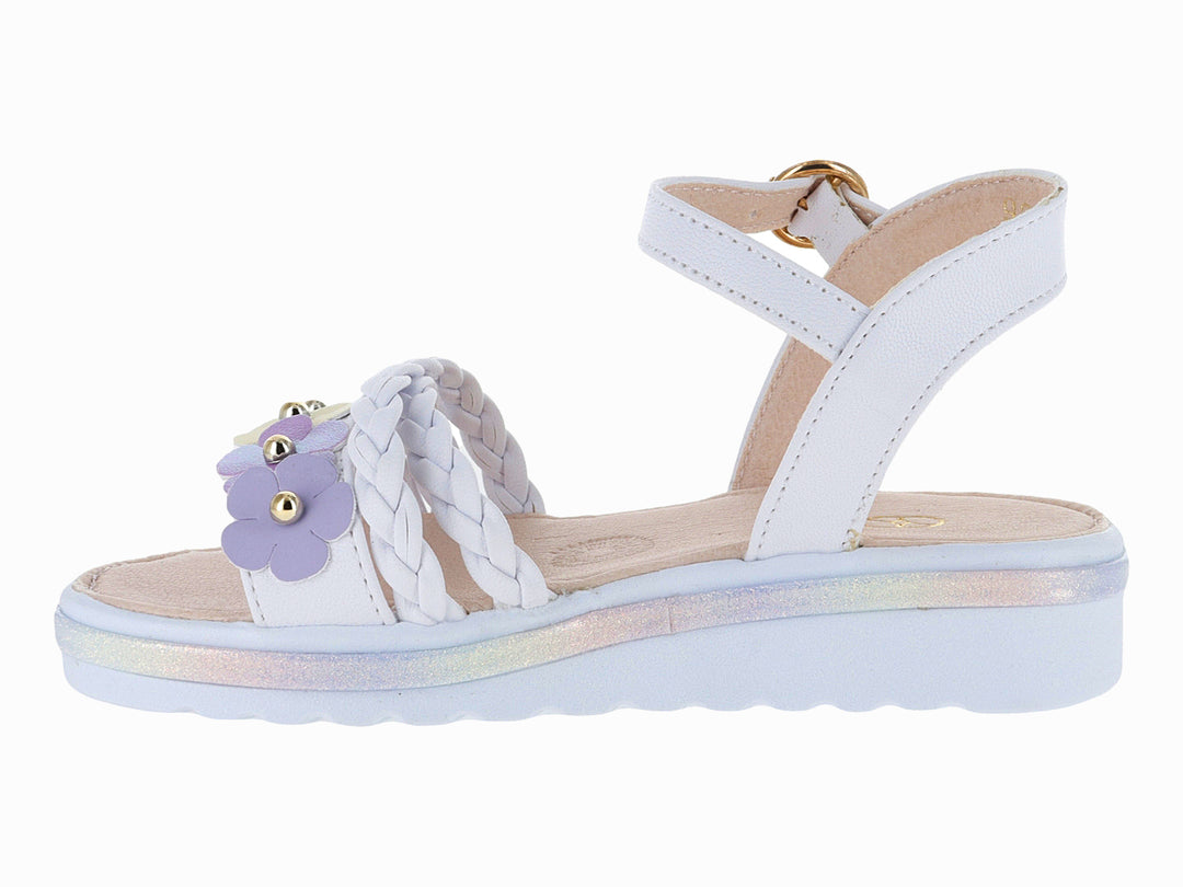 Sandalia blanca para niña con plataforma, correa trenzada y detalle de flor verde.