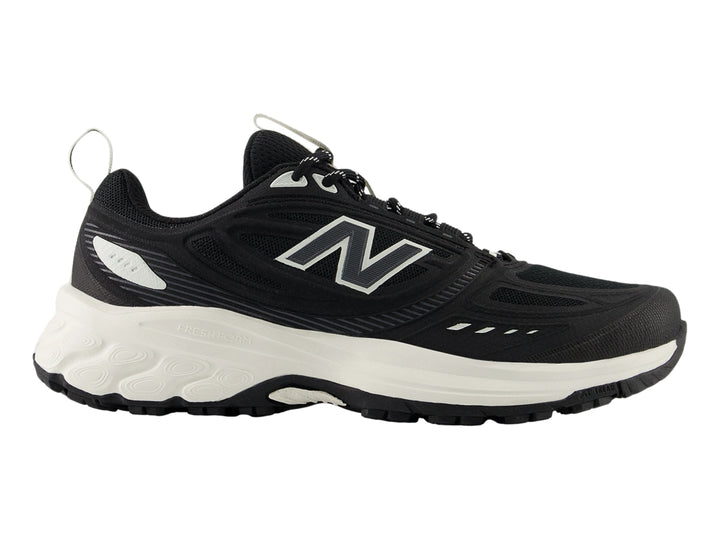 Tenis New Balance 410 color negro con suela blanca para mujer.