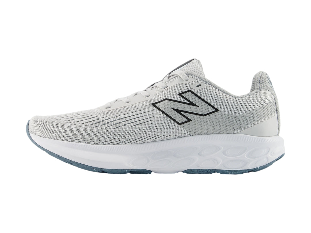 Tenis New Balance 520 color gris con suela blanca y detalles en azul para hombre