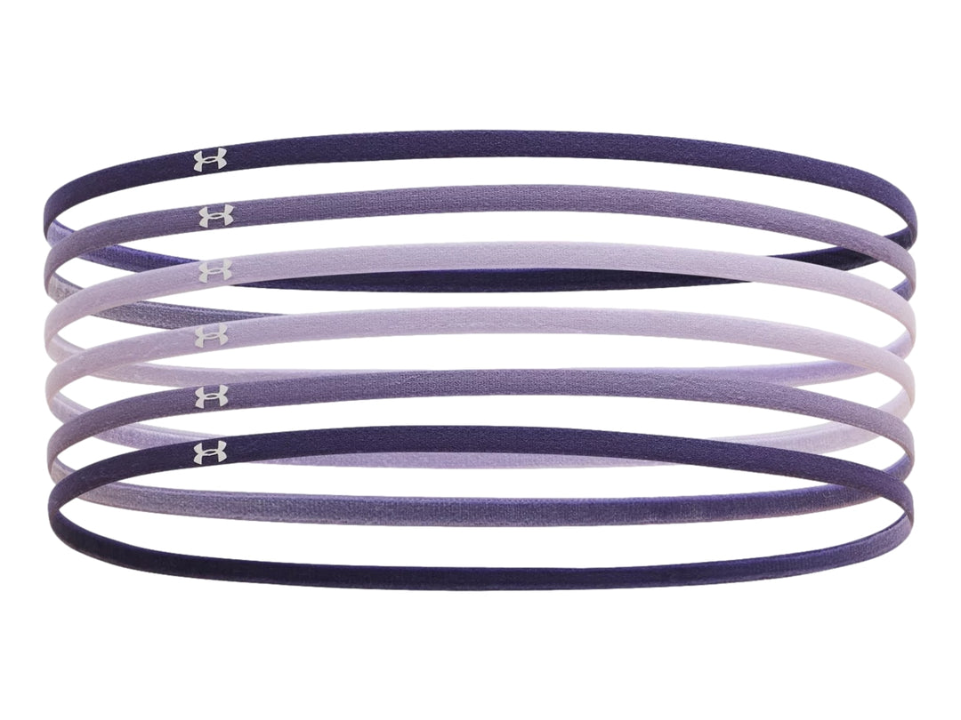 Set de 6 bandas elásticas de resistencia Under Armour en diferentes tonalidades de morado y lila.