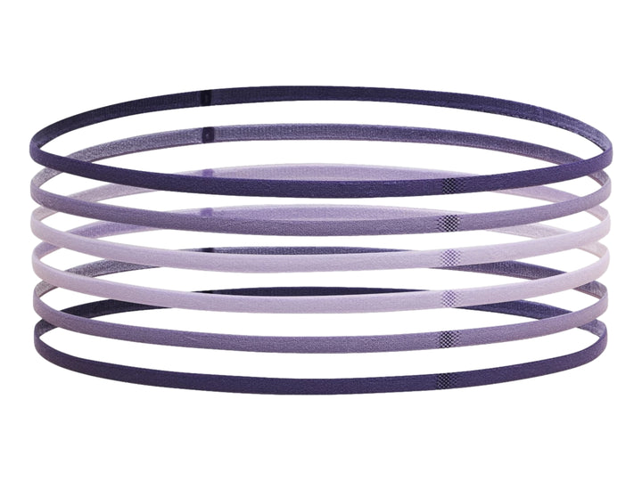 Set de 6 bandas elásticas de resistencia Under Armour en diferentes tonalidades de morado y lila.