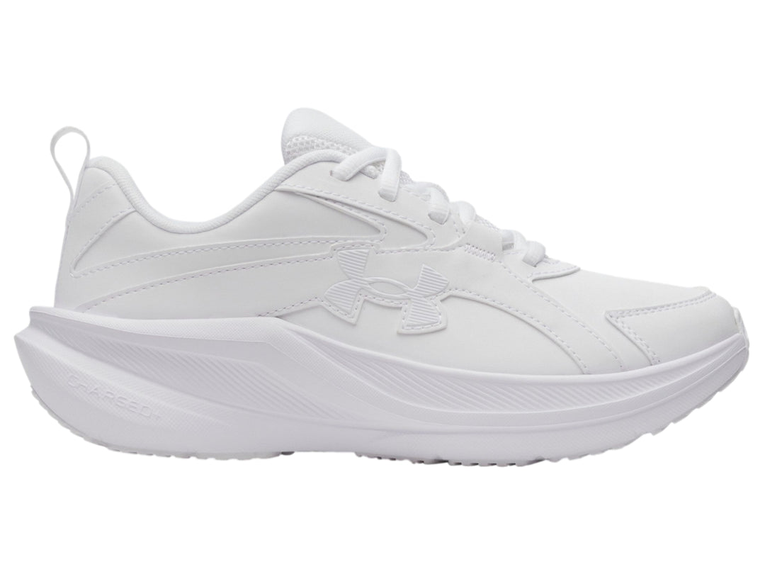 Tenis deportivos Under Armour color blanco para niño con suela robusta y cierre de cordones.
