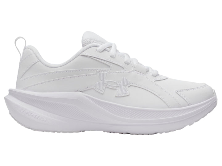 Tenis deportivos Under Armour color blanco para niño con suela robusta y cierre de cordones.