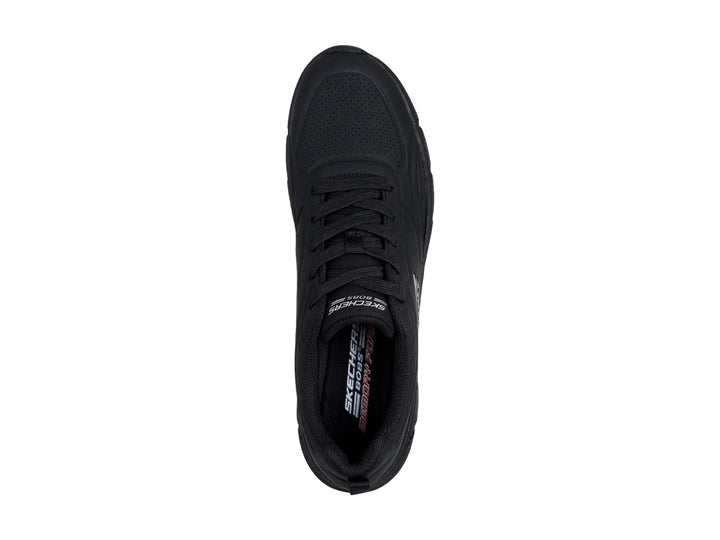 Tenis deportivos Skechers color negro con suela gruesa y cordones.