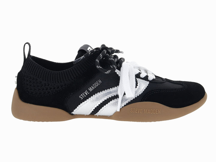 Tenis Steve Madden color negro con detalles en plata y suela color café.