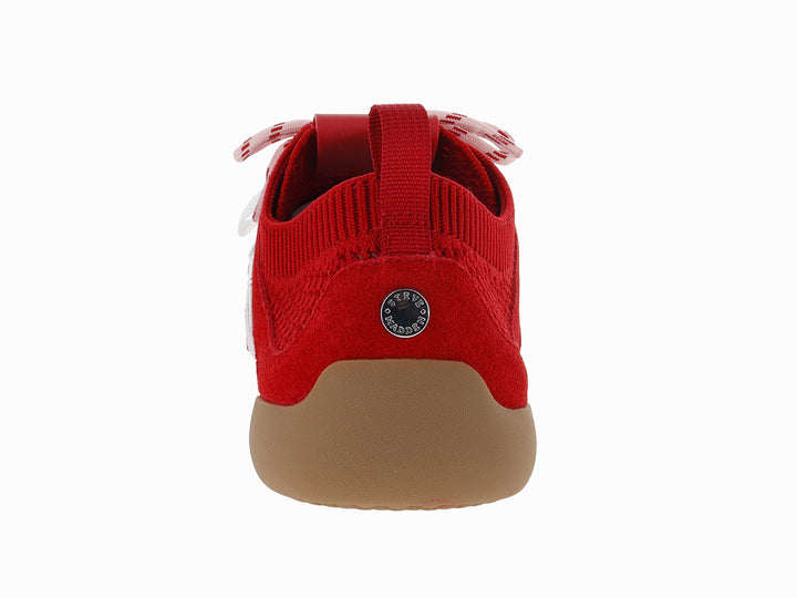 Tenis deportivos Steve Madden color rojo con franjas blancas y suela color café.
