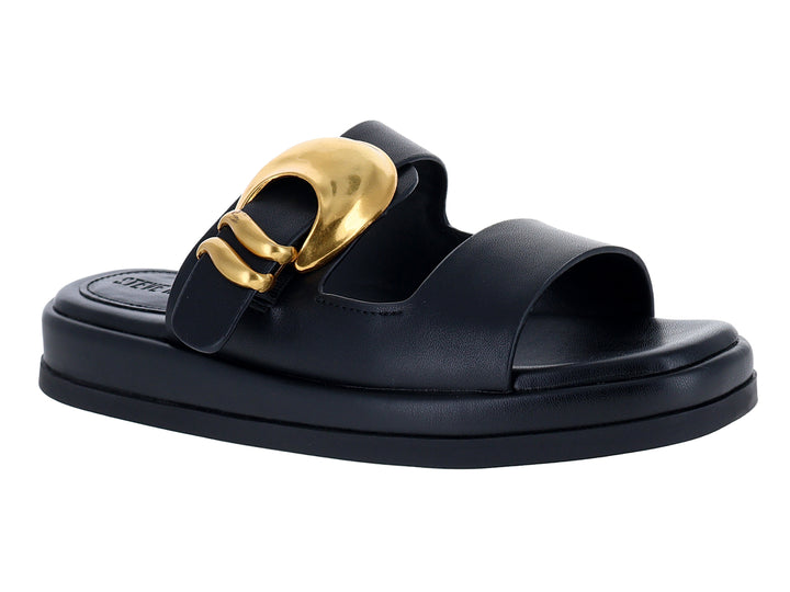 Sandalia negra Steve Madden con hebilla dorada y suela de plataforma.
