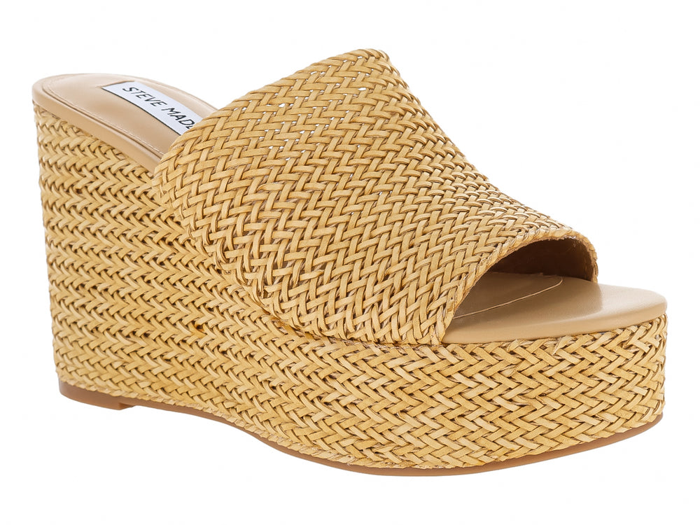 Sandalia de cuña color beige natural con textura tejida de raffia.