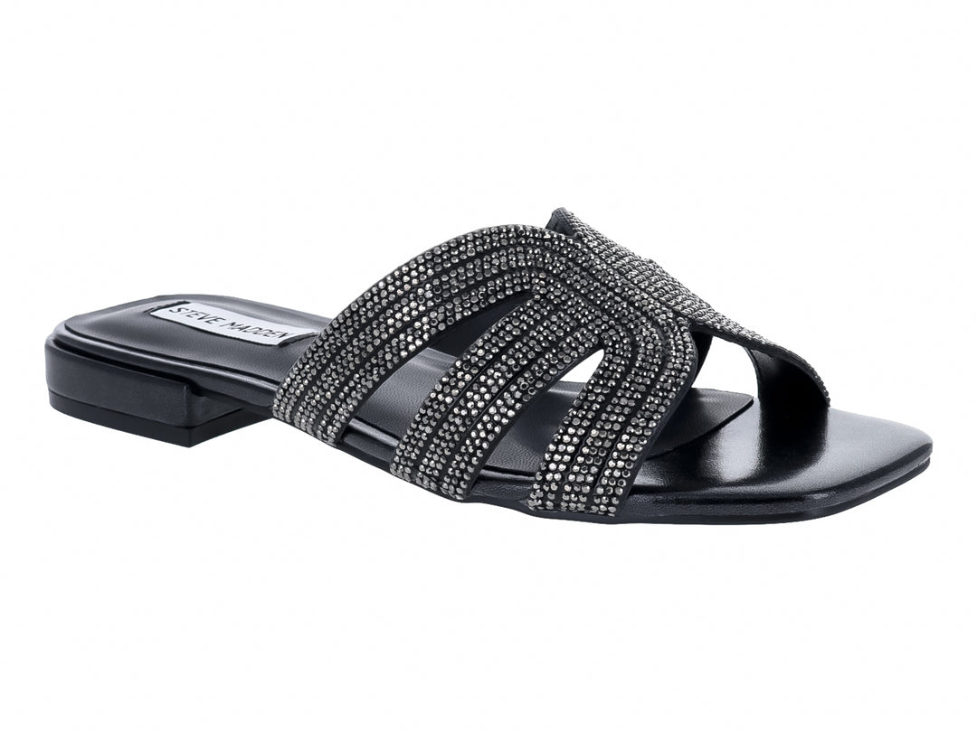 Sandalia negra de Steve Madden con tiras adornadas con cristales brillantes y suela plana.