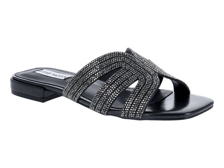 Sandalia negra de Steve Madden con tiras adornadas con cristales brillantes y suela plana.