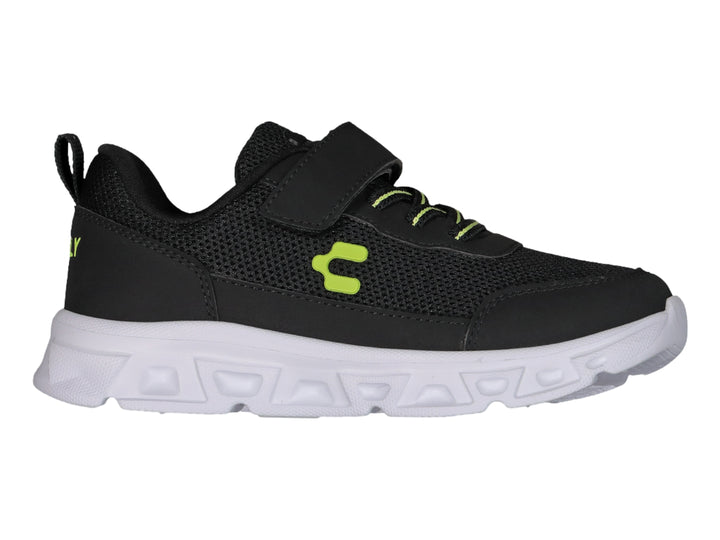 Tenis deportivos Charly color negro con suela blanca y detalles en amarillo neón.