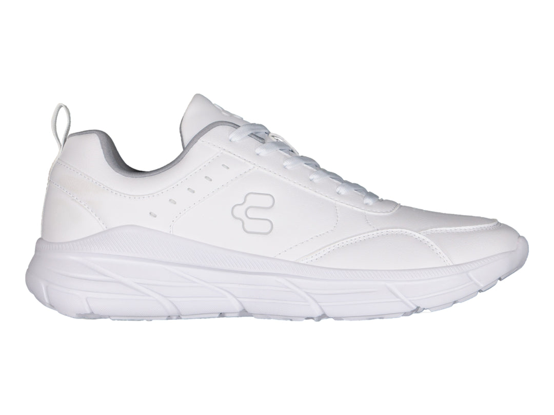 Tenis deportivos Charly color blanco con suela robusta y cordones, vista lateral sobre fondo blanco.