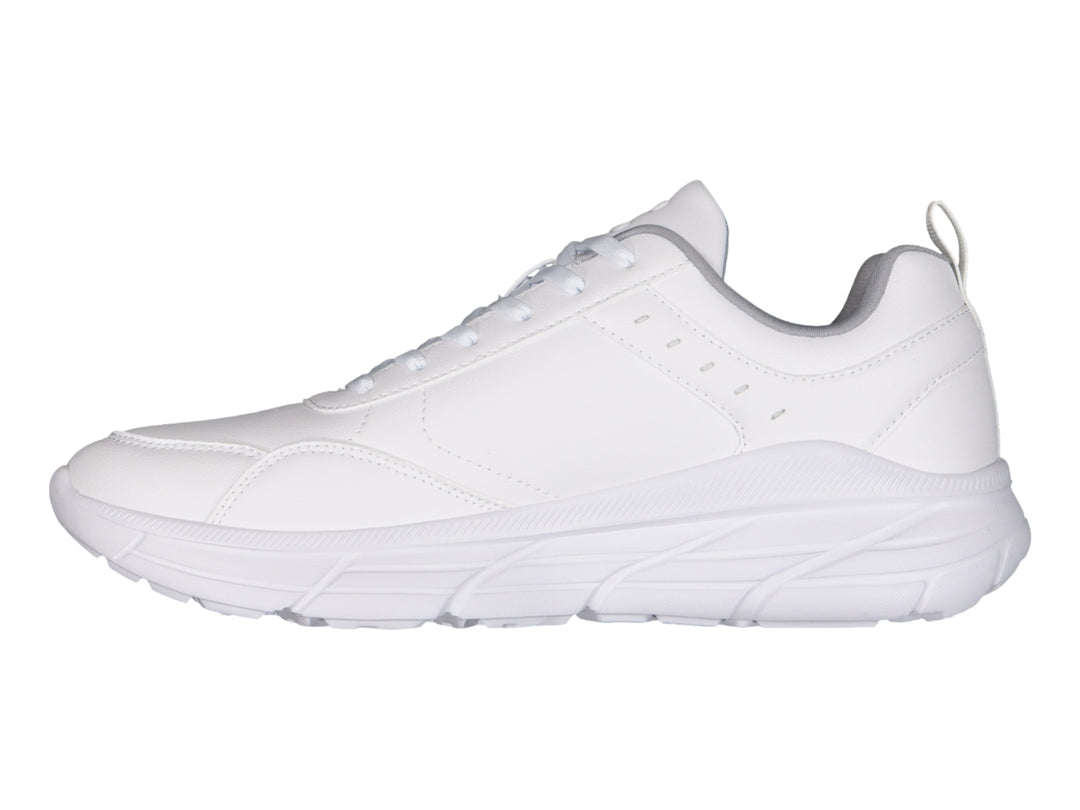 Tenis deportivos Charly color blanco con suela robusta y cordones, vista lateral sobre fondo blanco.