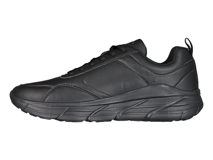 Tenis deportivos Charly color negro con suela gruesa y acabado mate.